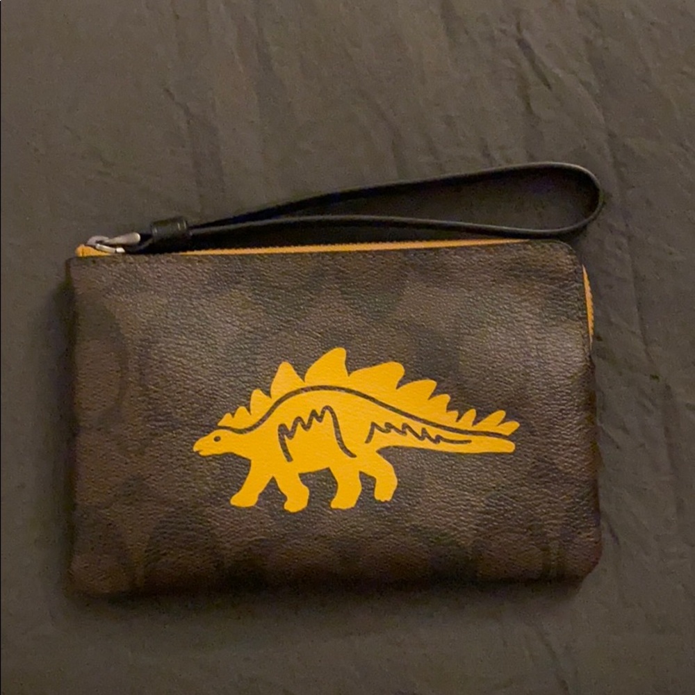 Coach corner zip wristlet with dinosaur